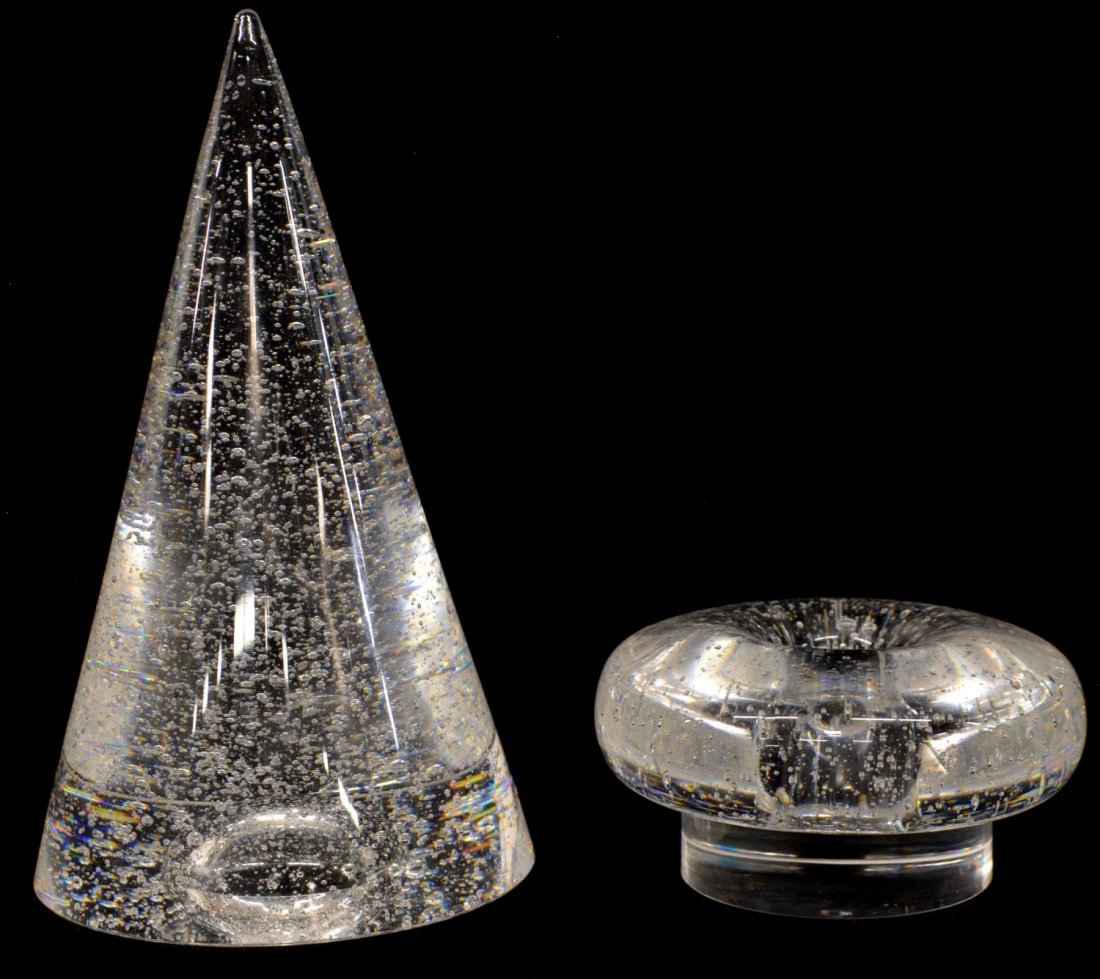 (2) STEUBEN ART CYRSTAL SUSPENDED BUBBLE ITEMS: (lot of 2) Steuben art crystal desk items, each colorless with many suspended air bubbles: (1) large conical paperweight, colorless glass with suspended air bubbles, 7"h; (1) low paperweight / candleh