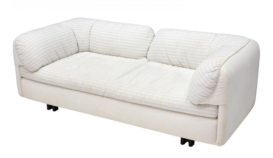 ITALIAN DESIGN ARFLEX UPHOLSTERED SOFA, 1980'S: Italian design upholstered sofa, by Arflex, 20th c., the low back over padded back and armrests, striped and cream upholstery, rising on black tube legs, 24"h, 71"l, 35"d Start Price: $150.00