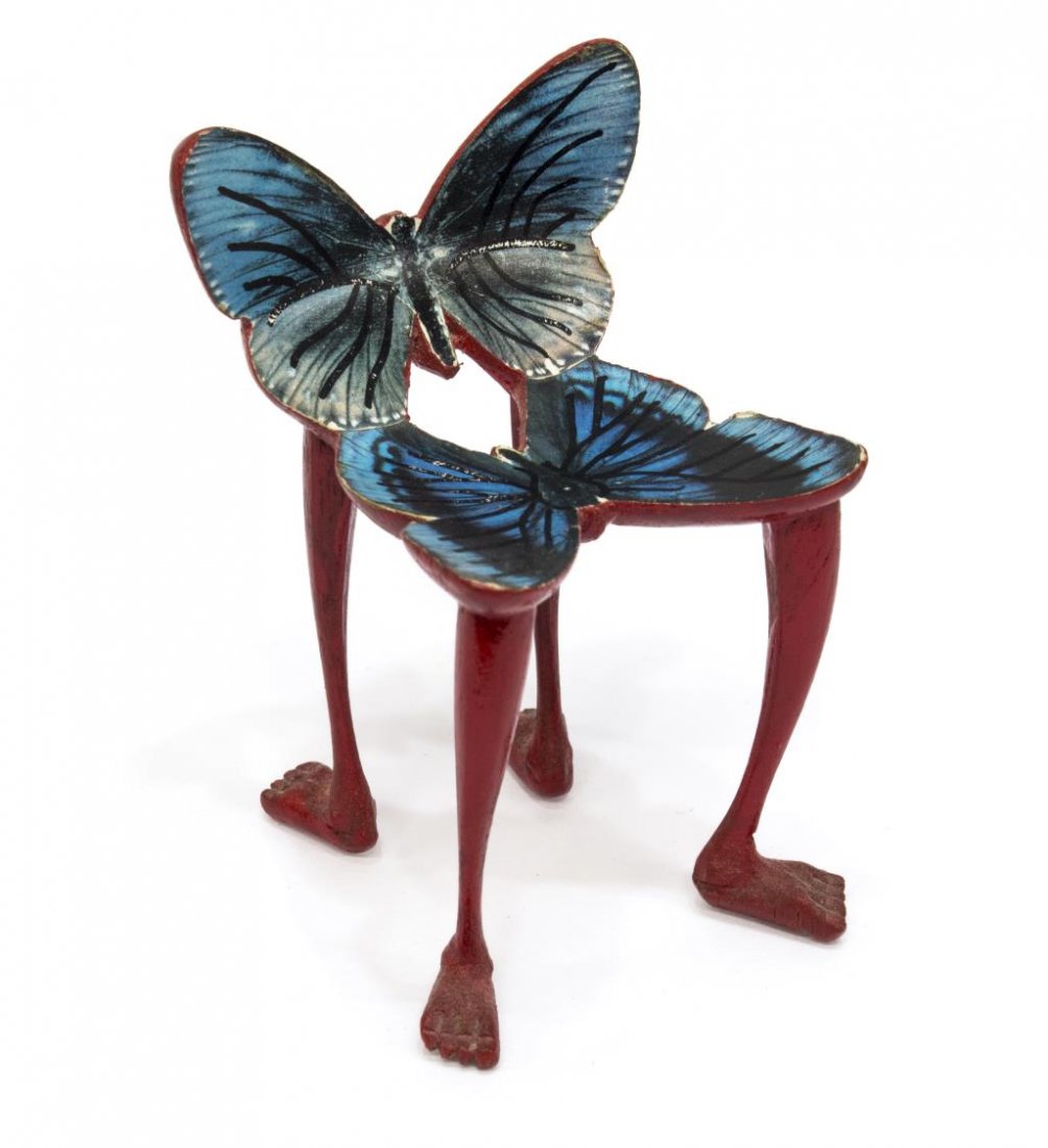 PEDRO FRIEDEBERG MINIATURE CARVED BUTTERFLY CHAIR: Pedro Friedeberg (Mexican / American, b. 1936) carved wood sculpture, Miniature Butterfly Chair, carved wood and printed paper, signed verso, approx 3.25"h, 2"h, 2"d *Provenance: The estate of Ferris