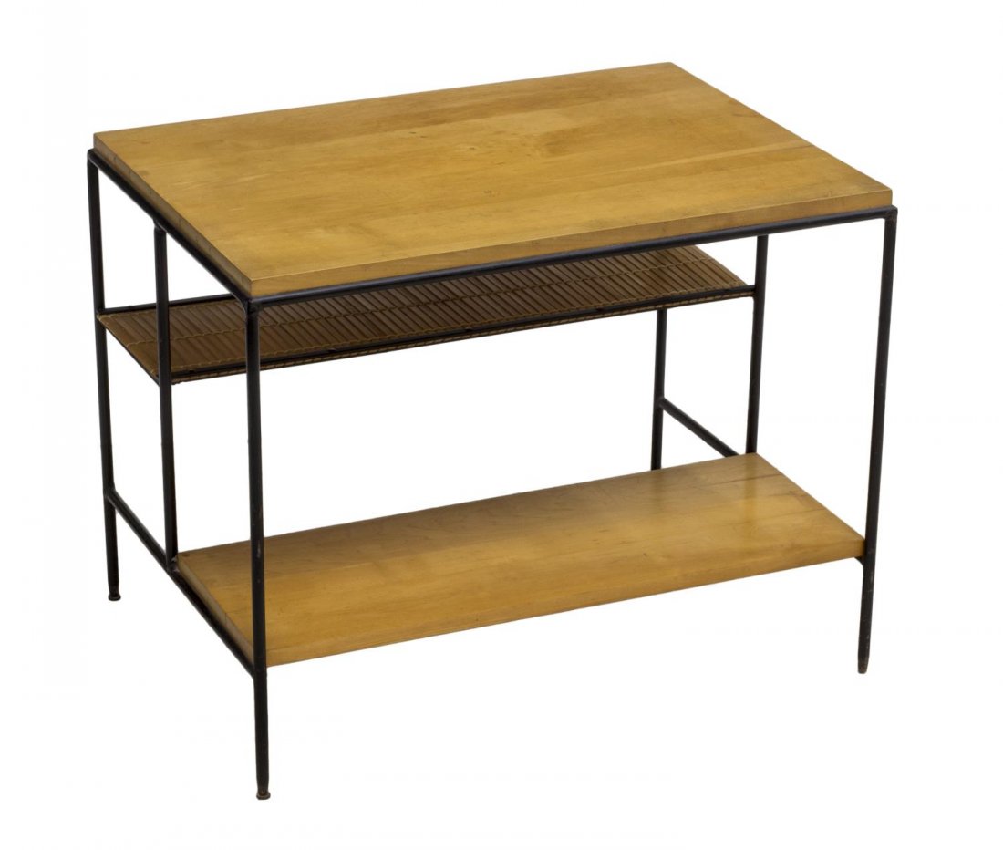 PAUL MCCOBB WOODEN & IRON SIDE TABLE, C. 1960: Birch wood and enameled iron side table, c. 1960, the rectangular top over a tight slat shelf and lower birch shelf, rising on tubular iron base, 22.5"h, 27"w, 19.75"d *Provenance: The estate of Ferri