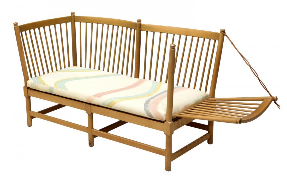 BORGE MOGENSEN & FRITZ HANSEN SPINDLE BACK SOFA: Danish beech spindle back sofa, by Borge Mogensen (Danish 1914-1972) for Fritz Hansen, the curved back set with plain spokes, one drop-down side, attachable cushions in abstract stripe print, rising o