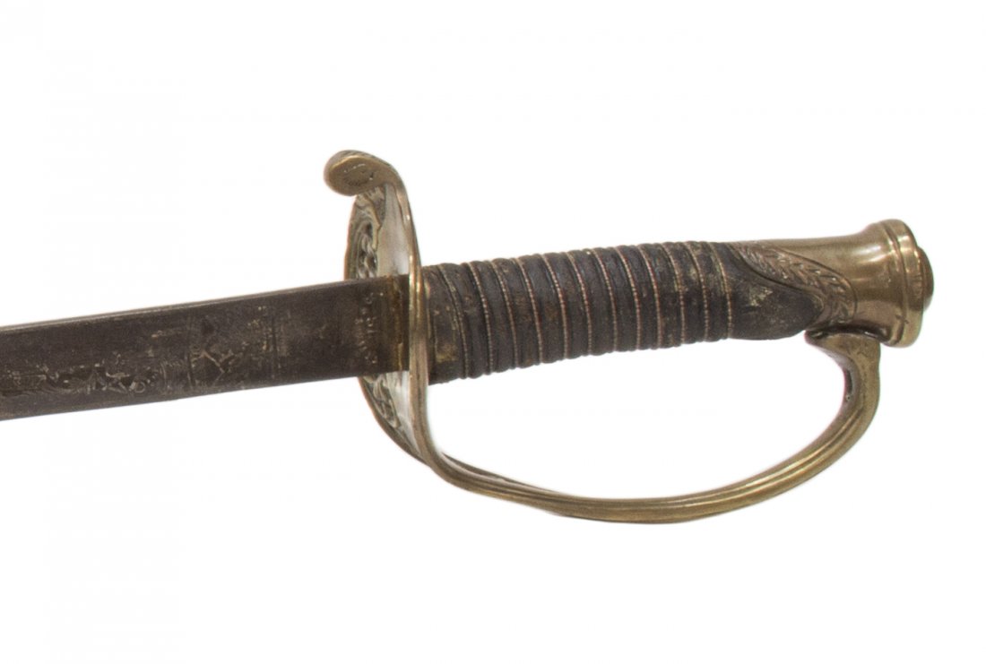 U.S. ARMY CIVIL WAR SWORD, TIFFANY & CO., 1862: U.S. Army Civil War Staff & Field Officers sword, Model 1850, the 34.35"l blade with foliate engraving, one side with "U.S.", the opposite side with "E Pluribus" over an eagle, the ricasso marked "Tif