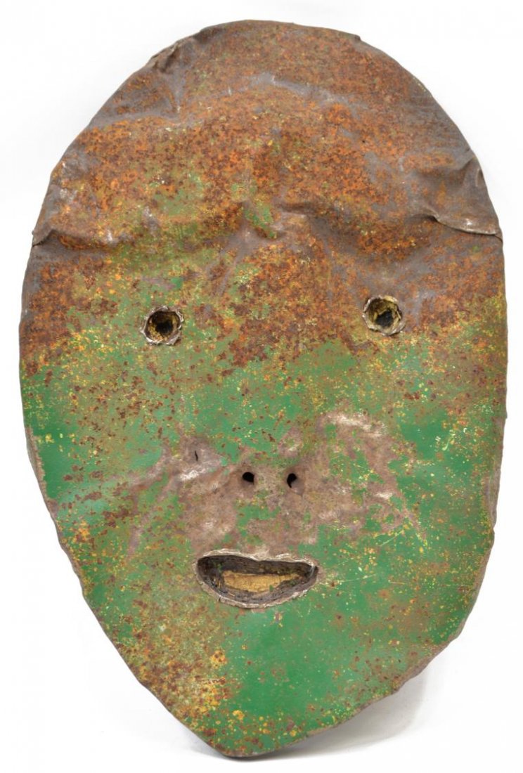 JIM COTTER MIXED MEDIAL FACE "PERKINS" WALL ART: Jim Cotter (American, 20th c.) mixed media wall hanging, "Perkins", a patinated iron mounted wood face, signed JW Cotter and titled verso, 15.75"h, 10.5"w, 2.5lbs *Provenance: The estate of Ferris and