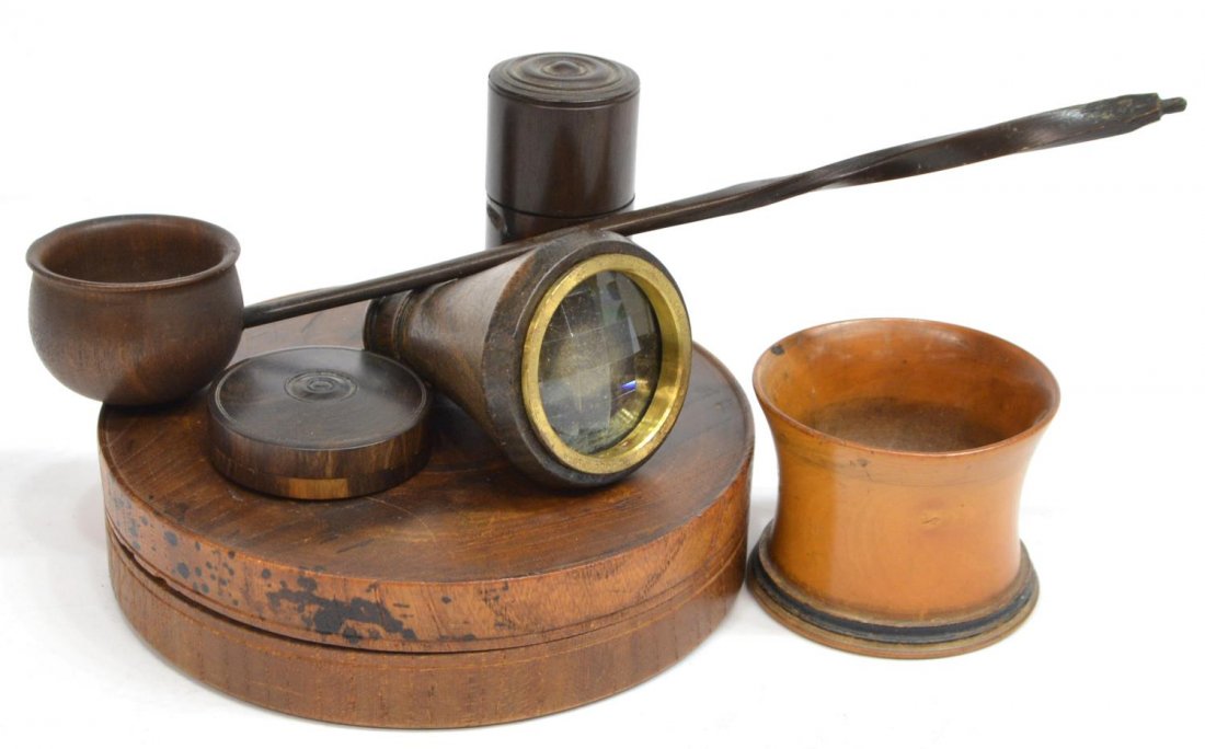 (6) ANTIQUE DIMINUTIVE TURNED TREEN TABLE ITEMS: (lot of 6) Antique turned treen group: (1) small cylinder, the screw top opens to fitted glass (ink?) bottle, split to lid, natural indention to wood on one side, approx 2.15"h; (1) measure, having tu