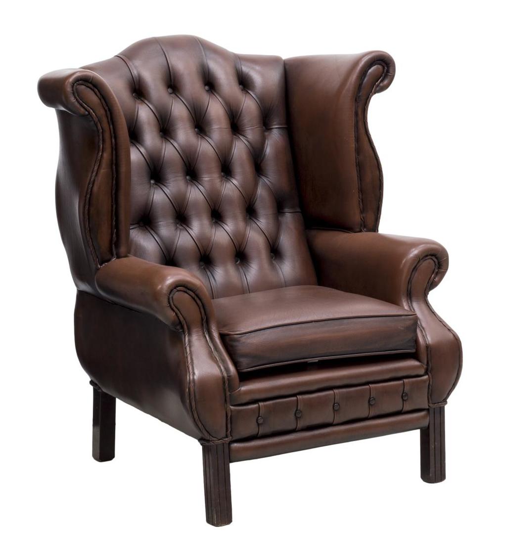ENGLISH GAINSBOROUGH BROWN LEATHER CLUB CHAIR: English Gainsborough style brown leather club chair, c. 1970, having a tufted backrest over scrolling armrests, removable seat cushion, rising on grooved straight legs, 43"h, 38"w, 27"d Start Price: $