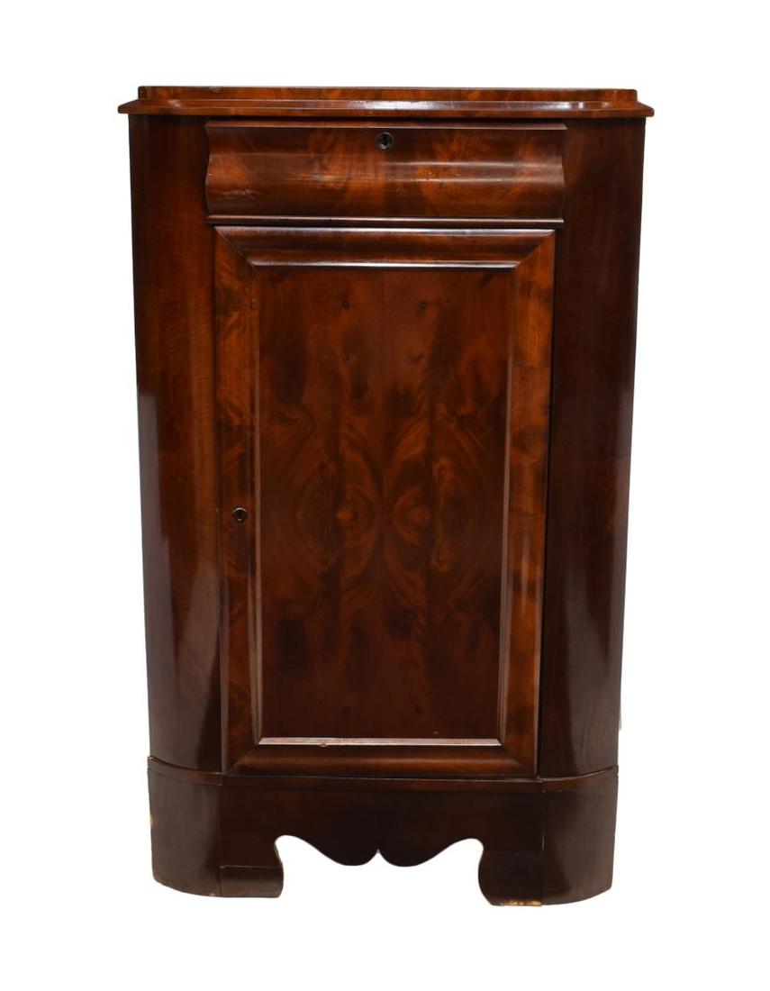 DANISH BIEDERMEIER MAHOGANY CORNER CUPBOARD: Danish Biedermeier style mahogany corner cupboard, c. 1900, the triangular top having a protruding rim over a single drawer and door, opening to shelved interior, rising on curved bracket feet, 57"h, 