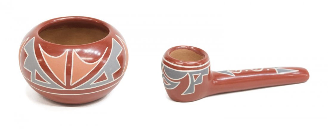 (2) BELEN TAPIA (1914-1999) SANTA CLARA PIPE & JAR: (lot of 2) Native American polychrome jar and pipe on red ground, both signed Belen Tapia (Santa Clara Pueblo, New Mexico, 1914-1999): (1) bowl, 2.5"h, 3"w; (1) pipe, 1.75"h, 5.5"l, total: 1lb Start P
