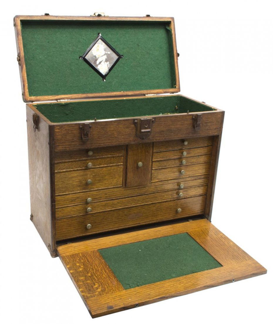 VINTAGE CRAFTSMAN OAK TEN DRAWER TOOL BOX: Craftsman oak dovetailed tool box, 1960's, a lift top opens to the felt lined interior unlocking the fall front door opening to reveal ten various sized drawers, 16"h, 20"w, 9.5"d, 27lbs Start Price: