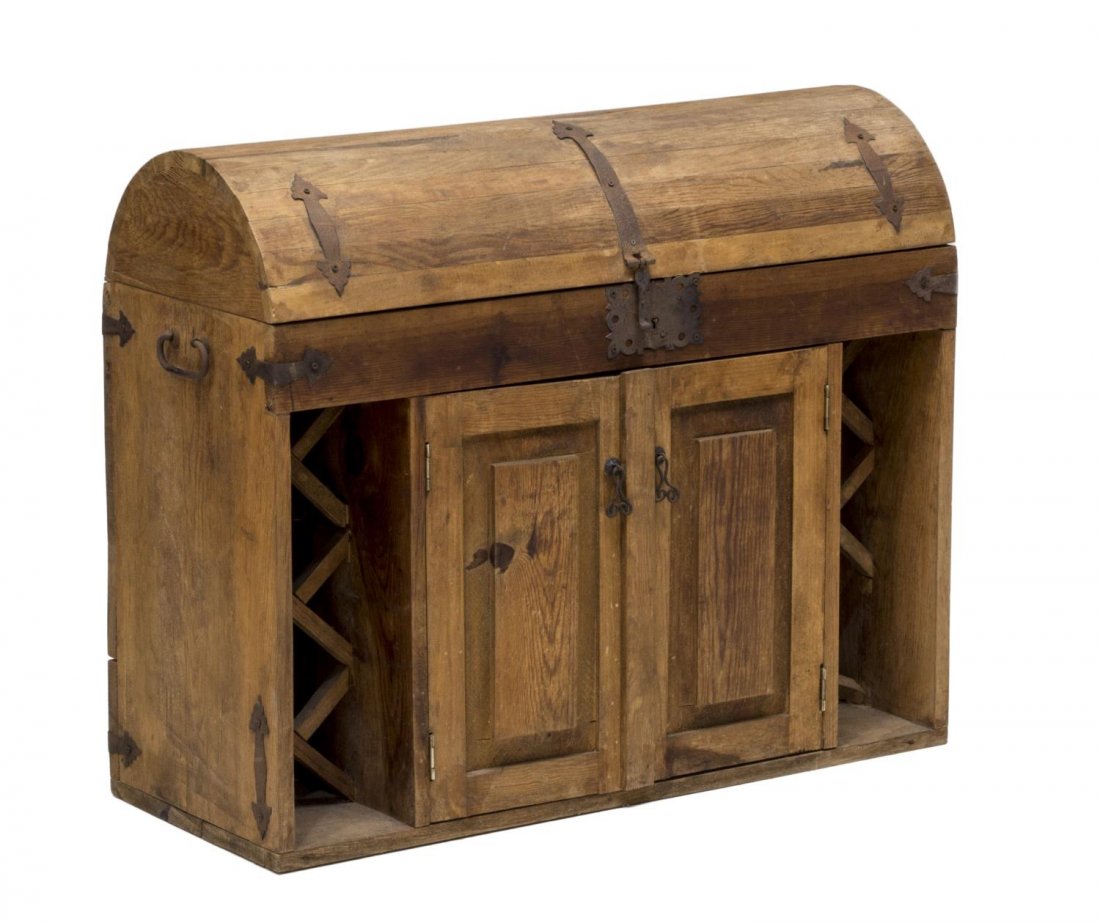 DOMED TOP WINE STORAGE CABINET: Domed top wine storage cabinet, having iron strapwork accents and lock, the hinged top opening to bottle storage, over two double doors, flanked by vertical lattice bottle holders, 31"h, 37.25"w, 15.5