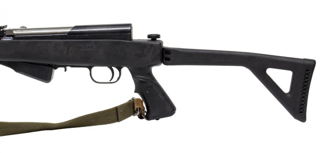 NORINCO FOLDING STOCK SKS ASSAULT CARBINE: Norinco Chinese SKS rifle, semi-automatic, 7.62 x 39 caliber, 20" barrel, 10 round stripper clip magazine, adjustable rear sight, hooded front sight, black synthetic folding stock with pistol grip, on