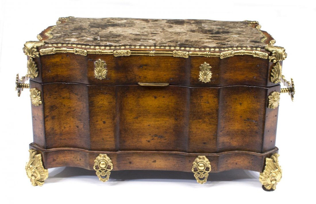 MAITLAND SMITH DECORATIVE STONE & WOODEN BOX: Maitland-Smith decorative lidded box, having a shaped top with variegated grey stone, gilt brass mounts, foliate handles, the hinged top opening to black suede interior, rising on short legs with foli