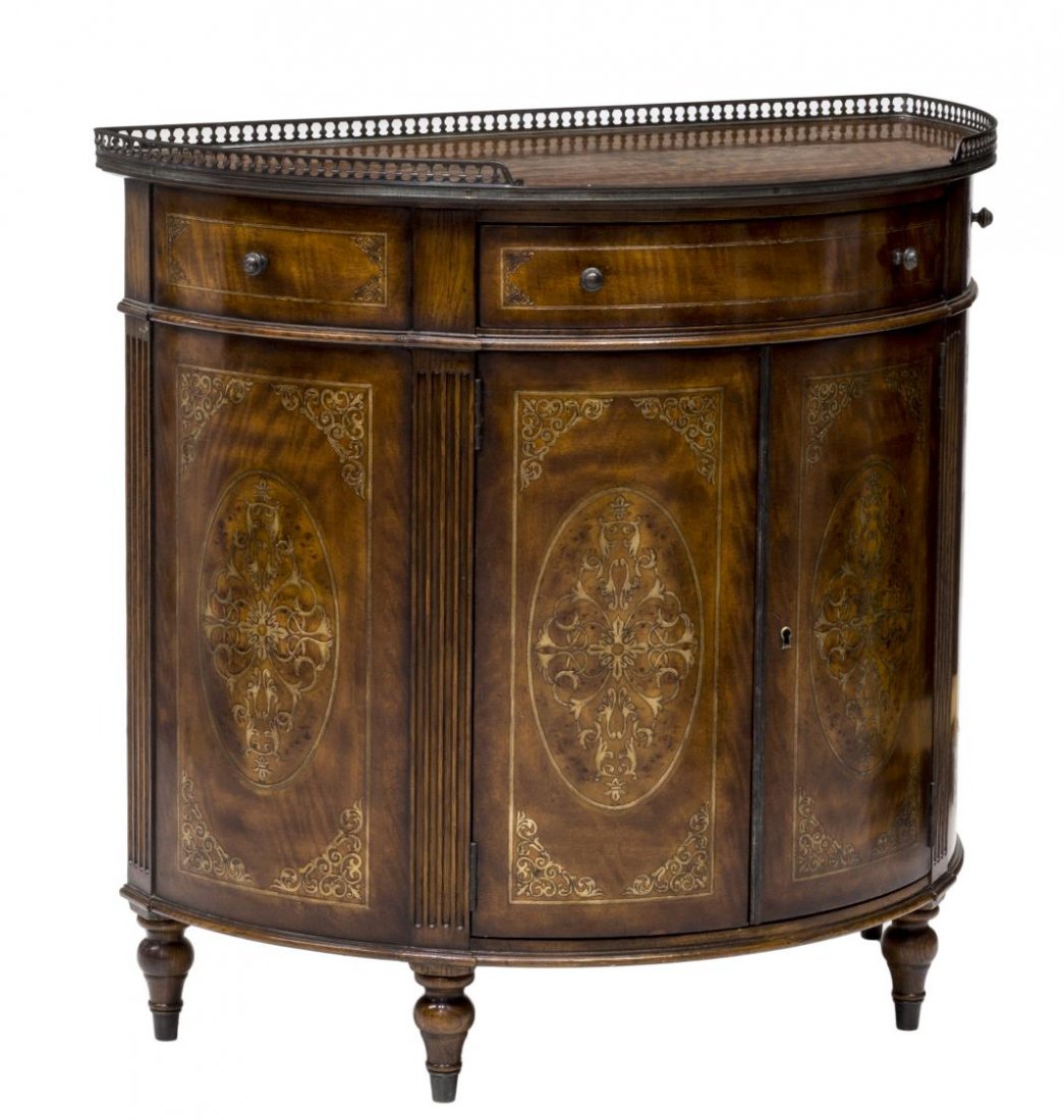 THEODORE ALEXANDER DEMILUNE INLAID CONSOLE CABINET: Theodore Alexander demilune console table accented with scrolled and foliate inlay, the top having a black metal pierced rail over a single frieze drawer above two doors opening to the shelved interio