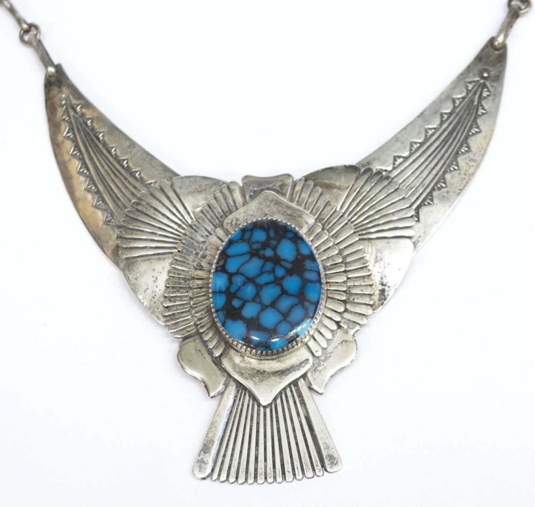 NATIVE AMERICAN SILVER EDDY CHACO EAGLE NECKLACE: Native American estate silver and turquoise necklace, by Eddy Chaco (Navajo, 20th c.), most likely sterling, eagle form collar necklace set with oval turquoise stone, hallmarked on back, unmarked silv