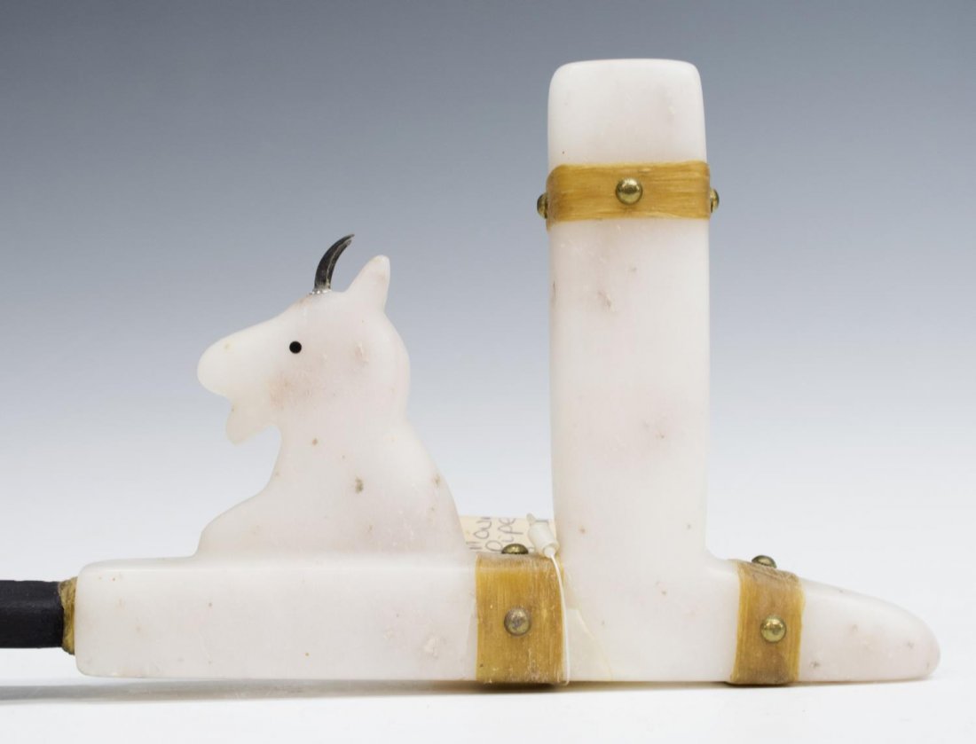 JOHN FREESOUL (CHEYENNE, ARAPAHO) STONE PEACE PIPE: Mountain Goat ceremonial peace pipe signed at the underside John Freesoul (John Redtail Freesoul, Cheyenne Arapaho, 20th c.), translucent white alabaster, the bowl/chamber formed as a chimney placed b