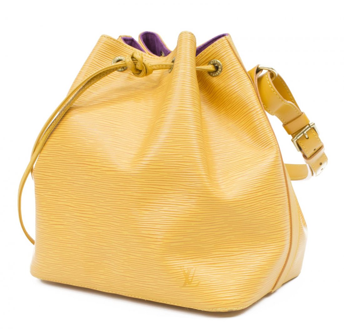 LOUIS VUITTON 'NOE PM' EPI LEATHER SHOULDER BAG: Louis Vuitton "Noe PM" drawstring bucket bag in Tassil yellow Epi leather, having an adjustable strap, gold tone hardware, the drawstring top opens to purple interior with key tab, accompanied by dust