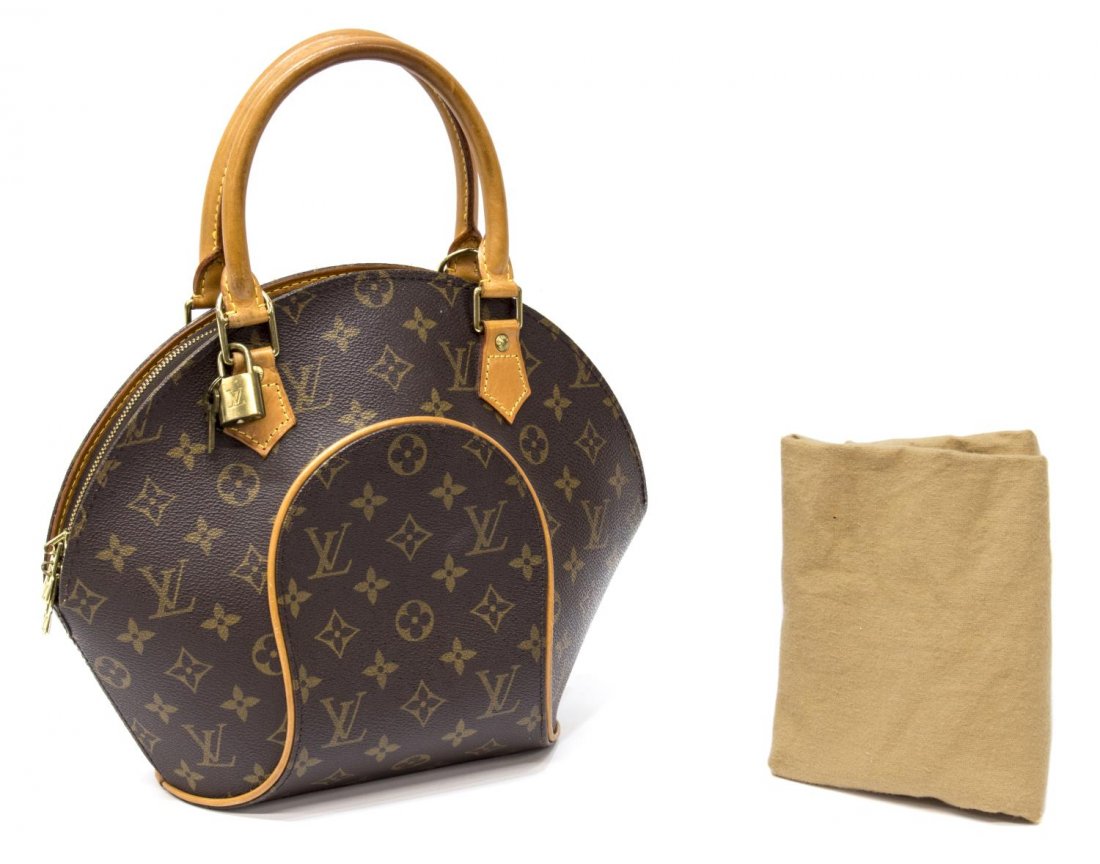 LOUIS VUITTON 'ELLIPSE' MONOGRAM CANVAS HANDBAG: Louis Vuitton brown monogram canvas "Ellipse" handbag, honeyed leather handles and piping, interior slot pocket, retaining lock and key, dust bag, approx 10"h, 12.5"w, 5.5"d, 1lb *Provenance: Luxury g