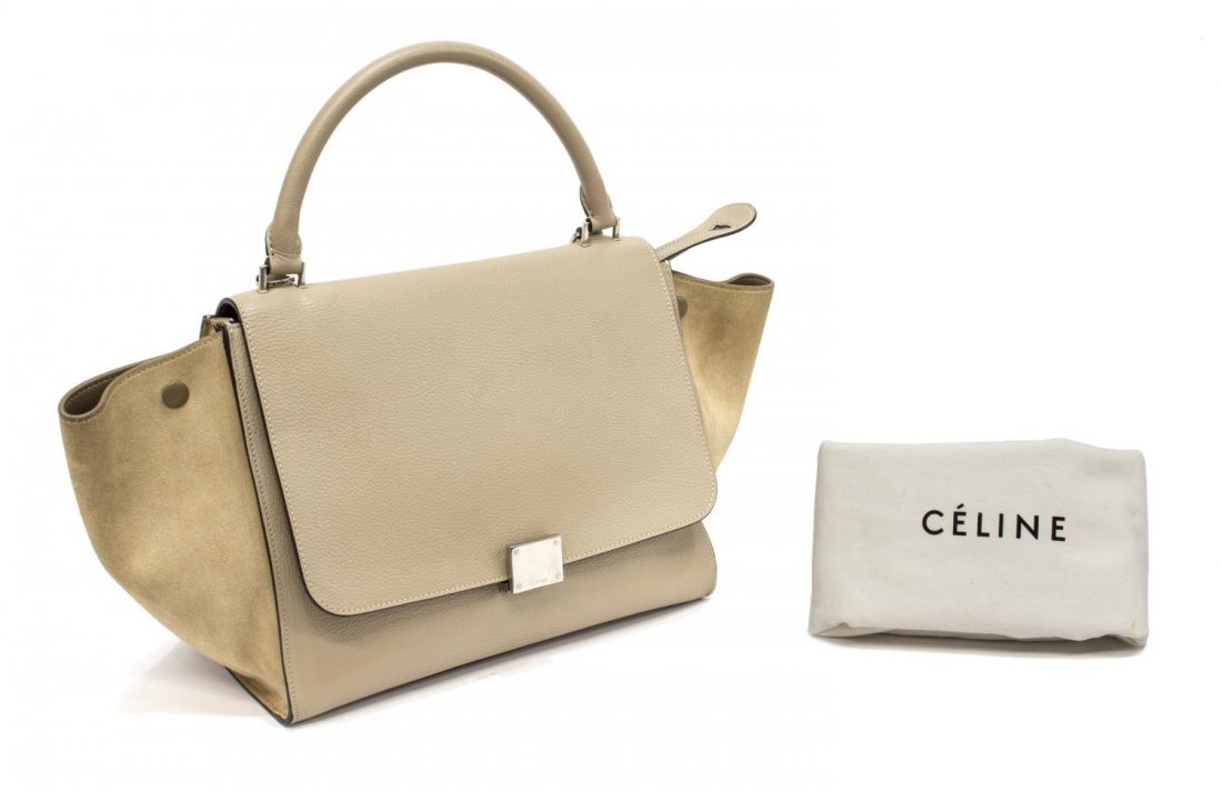 CELINE 'TRAPEZE' SUEDE & LEATHER HAND BAG: Celine "Trapeze" hand bag in taupe suede and leather, having silver tone hardware, single handle over flap top with folding closure, over zipper opening, tonal lined interior with hanging slot pockets