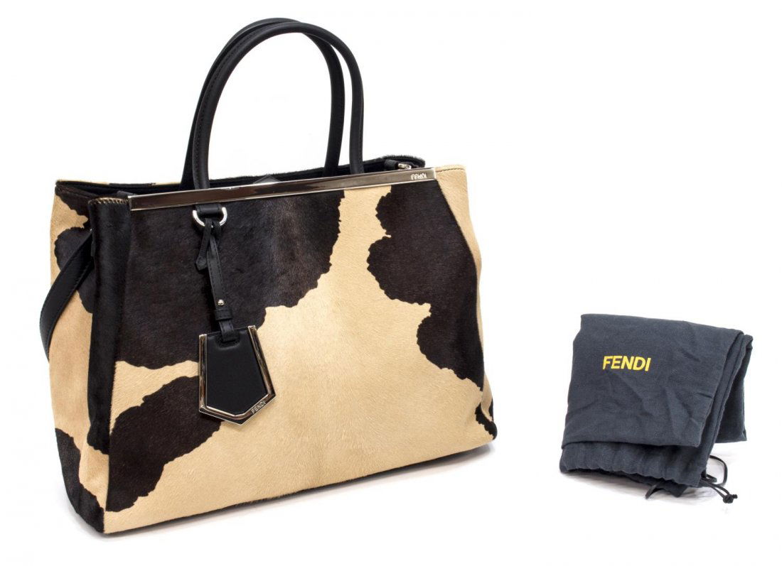 FENDI '2JOURS' DYED CALF HAIR & LEATHER HANDBAG: Fendi "2Jours" dyed calf hair and leather trim handbag, having silver tone hardware, duel roll handles over tab closure top, lined interior with double compartments centered by zipper pocket, accompan