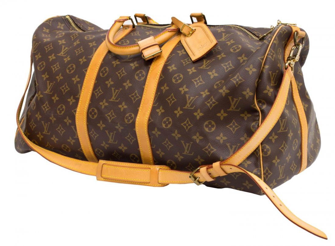 LOUIS VUITTON 'KEEPALL 55' BANDOULIERE DUFFLE BAG: Louis Vuitton monogram canvas 'Keepall 55" Bandouliere traveling duffle bag, adjustable and detachable strap, leather handles and trim, retaining luggage tag, gold tone hardware with dual zippers, ope
