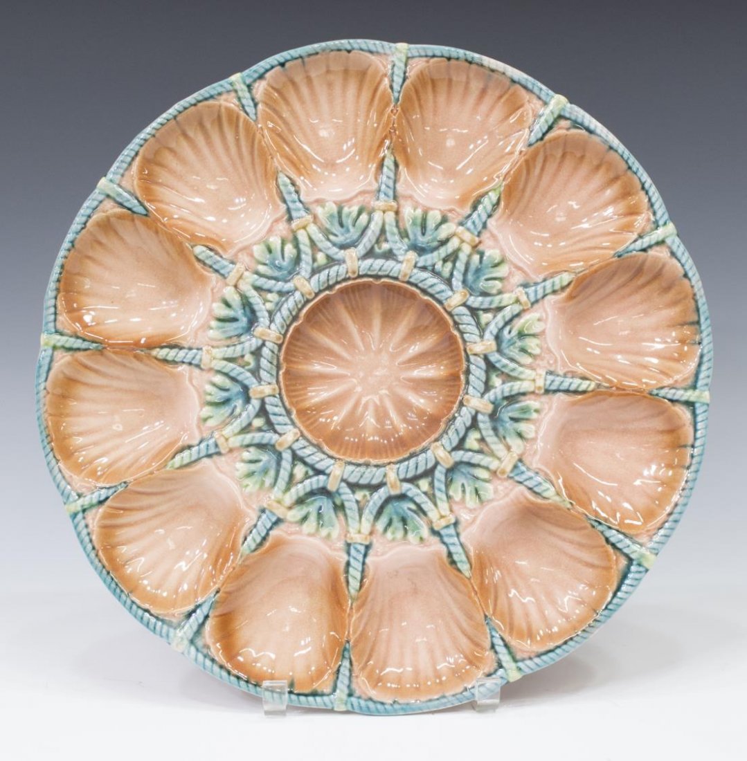 SARREGUEMINES FRENCH MAJOLICA OYSTER DISH: Sarrguemines majolica oyster dish, France, 20th c., foliate and oyster shell design, numbered and marked underfoot, approx 1.5"h, 14"diam, 3.75lbs total Start Price: $80.00
