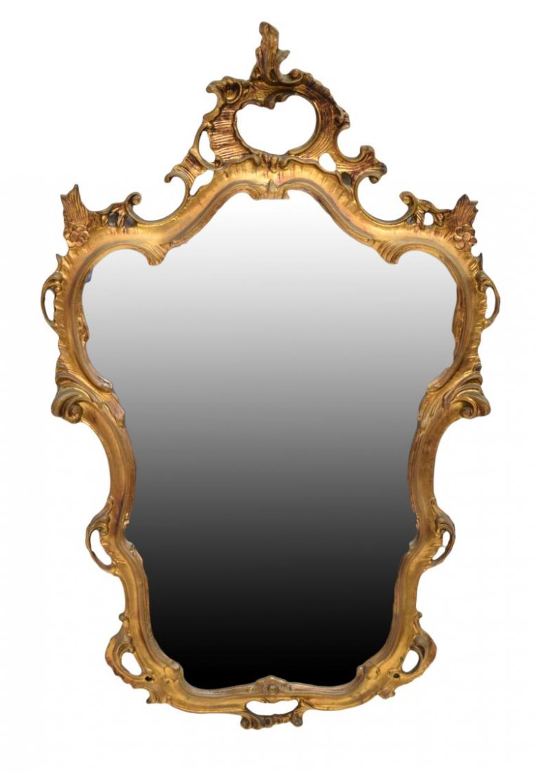 ITALIAN LOUIS XV STYLE GILTWOOD WALL MIRROR: Italian Louis XV style carved and pierced giltwood wall mirror, slight gilt loss, much spotting to plain mirror plate, approx 44.25"h, 29"w, 15.75lbs Start Price: $150.00
