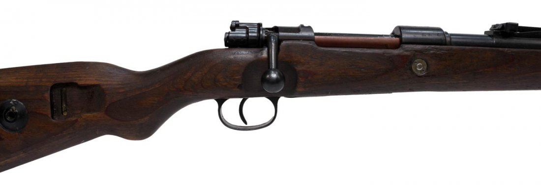 NAZI MARKED GERMAN MAUSER K98K: German Mauser, Model K98K, 8mm, bolt action, 24" barrel, adjustable rear sight, markings include "147 over 1940" at top of receiver, Nazi marks at barrel, receiver and bolt assembly, matched serial nu
