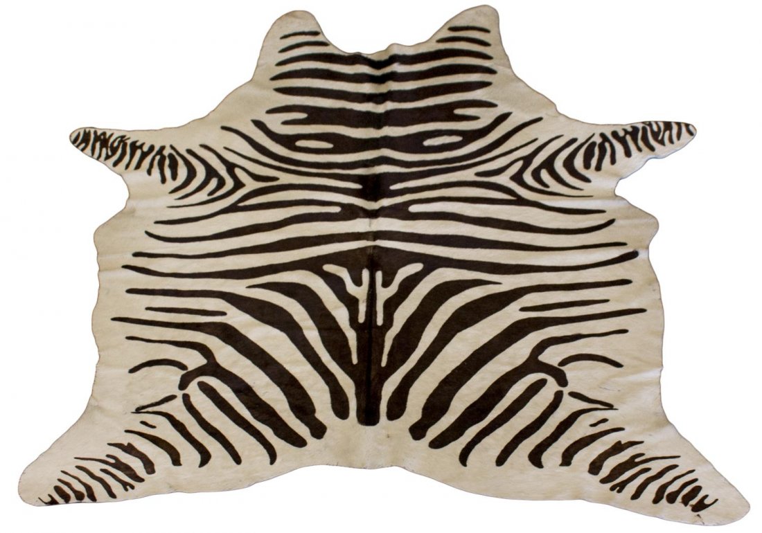 BRAZILIAN COWHIDE IN A ZEBRA PRINT: Brazilian cowhide appearing as a zebra hide, some repairs visible from underside, 6lbs Start Price: $100.00
