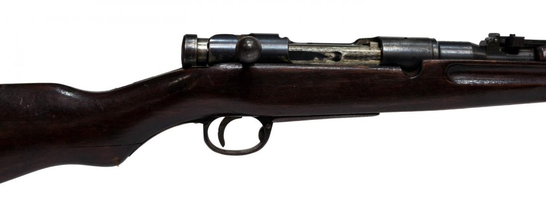 JAPANESE ARISAKA TYPE 38 CARBINE: Japanese Arisaka rifle, Model 38 Carbine, 6.5mm caliber, bolt action, 20" barrel, adjustable rear sight, two sling swivels, markings include "263R" at top of receiver, Kokura Arsenal symbol at left re