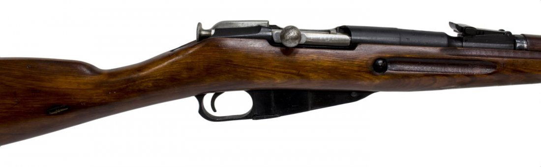 RUSSIAN MODEL 1944 CARBINE, FOLDING BAYONET: Russian Model 1944 Carbine, bolt action, 7.62mm caliber, 20" barrel, hooded front sight, adjustable rear sight, cleaning rod, folding bayonet, top of the receiver marked: "hammer and sickle in wreath,