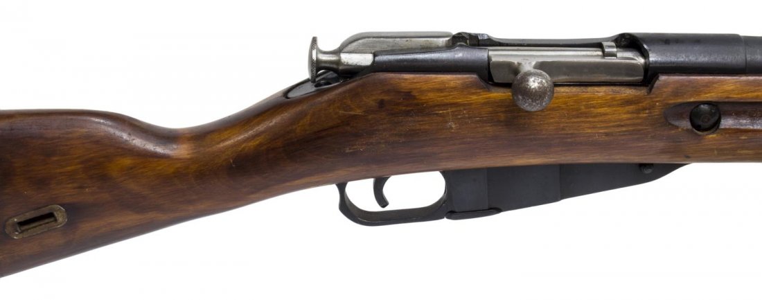 RUSSIAN MODEL 1938 CARBINE, MOSIN-NAGANT: Russian Model 1938 Carbine, bolt action, 7.62mm caliber, 20" barrel, hooded front sight, adjustable rear sight, cleaning rod, top of the receiver marked: "hammer and sickle in wreath, 1943, serial num