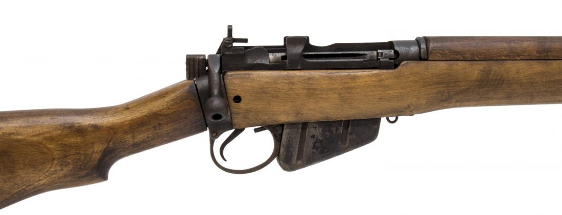 ENFIELD No 4 RIFLE & BAYONET: Enfield No4Mk1 rifle built by Savage-Stevens for the UK, .303 caliber, bolt action, 25" barrel, mounted spike bayonet, lacking butt plate, markings include "U.S. Property" at left receiver above "5 No