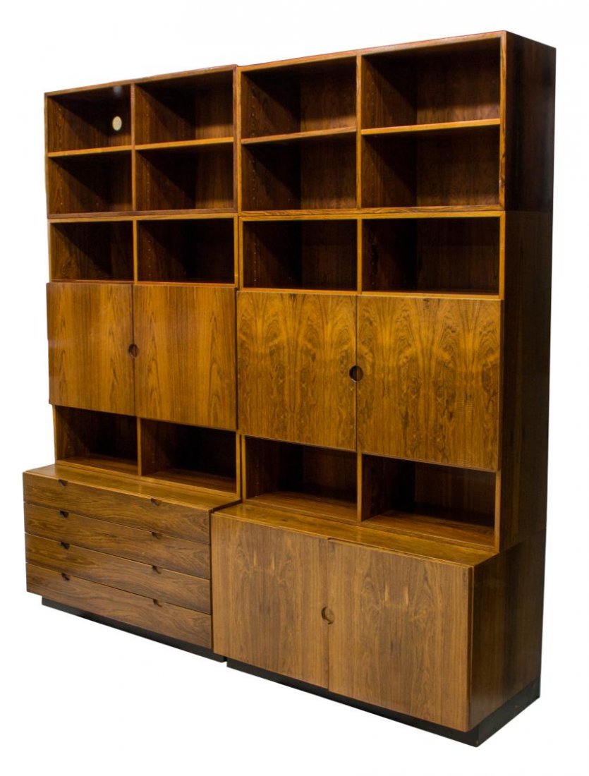 BRAMIN MID-CENTURY MODERN BOOKCASE WALL UNITS: Danish Bramin Mobler mid-century modern rosewood finish bookcase wall units, 1960's, each with adjustable height shelved storage, two central doors opening to storage, one with two lower doors, the ot