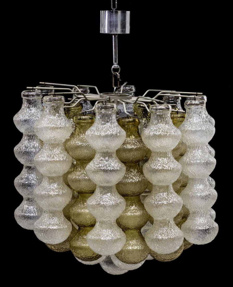 ITALIAN DESIGN GLASS & STEEL CHANDELIER, C. 1950: Italian mid-century modern glass and steel chandelier, c. 1950, having (26) clear and yellow shaped textured glass pods hanging from two tiers, enclosing (5) light sockets, 30"h, 22"diam Start Price: