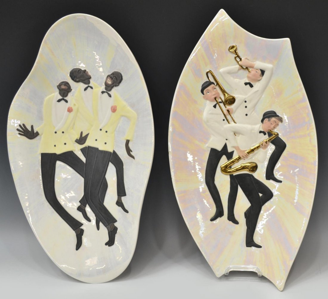 (2) VINTAGE ITALIAN WALL CHARGERS WITH MUSICIANS: (lot of 2) Large Italian ceramic wall chargers, musicians and singers against an iridescent ground, varied shape, loss to one corner as pictured, largest 22"l, 8lbs Start Price: $80.00
