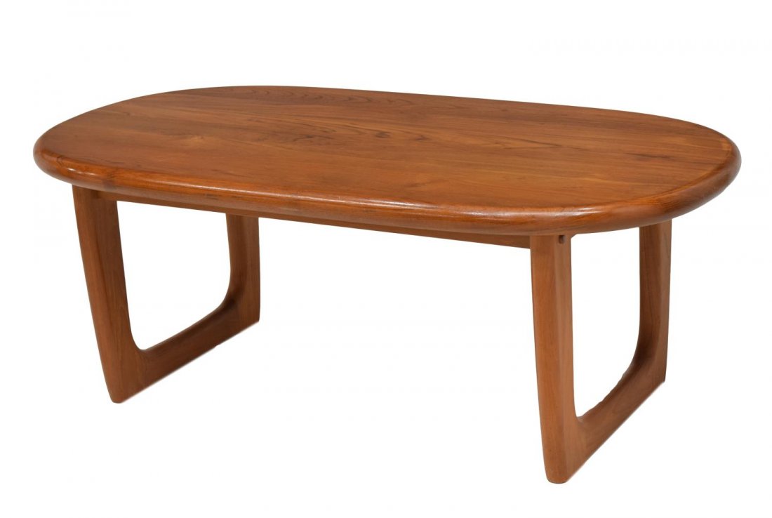 NIELS BACH NO.145 SOLID TEAKWOOD COFFEE TABLE: Danish modern solid teakwood coffee table, designed by Niels Bach, model #145, oval top over thick square open frame bases, maker's mark underneath, some light surface wear and wear to legs, Start Pri