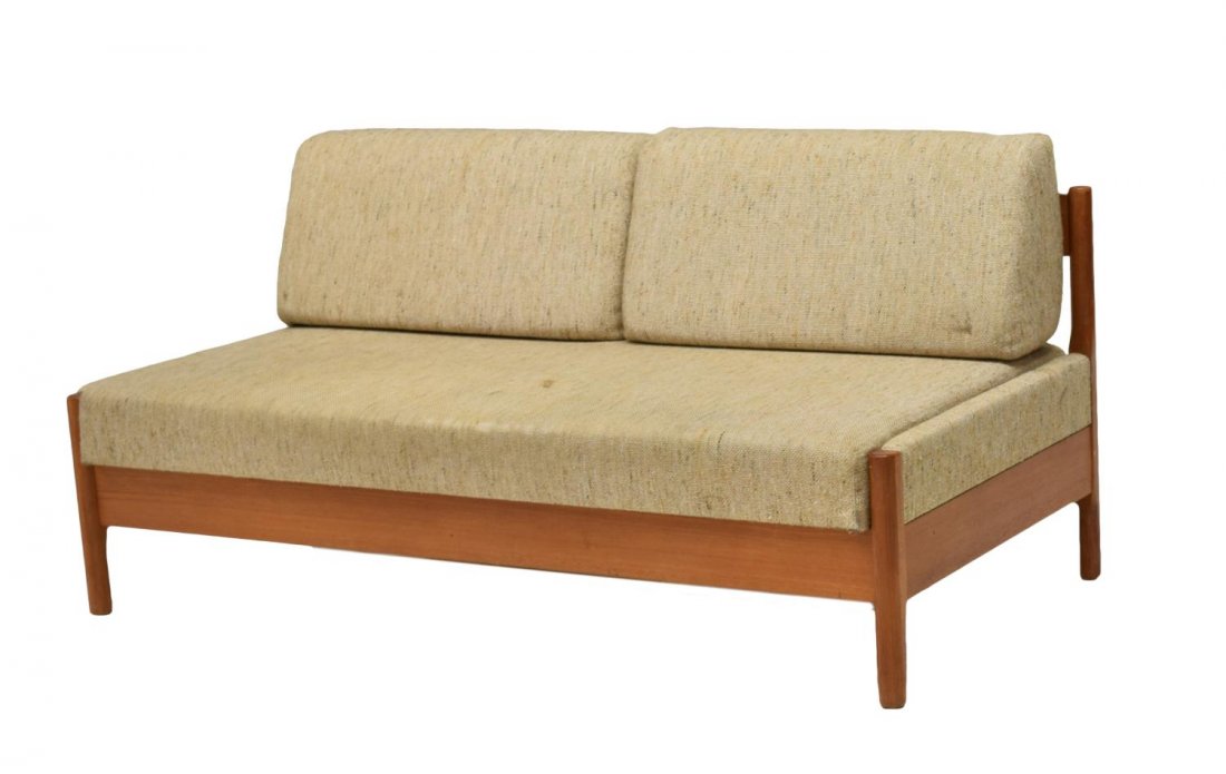 DANISH MID-CENTURY MODERN TEAK DAYBED SOFA 1960: Danish mid-century modern daybed sofa, c. 1960, the teakwood frame issuing two angled back cushions, over hinged single cushion, opening to storage compartment, rising on cylindrical legs, some stains