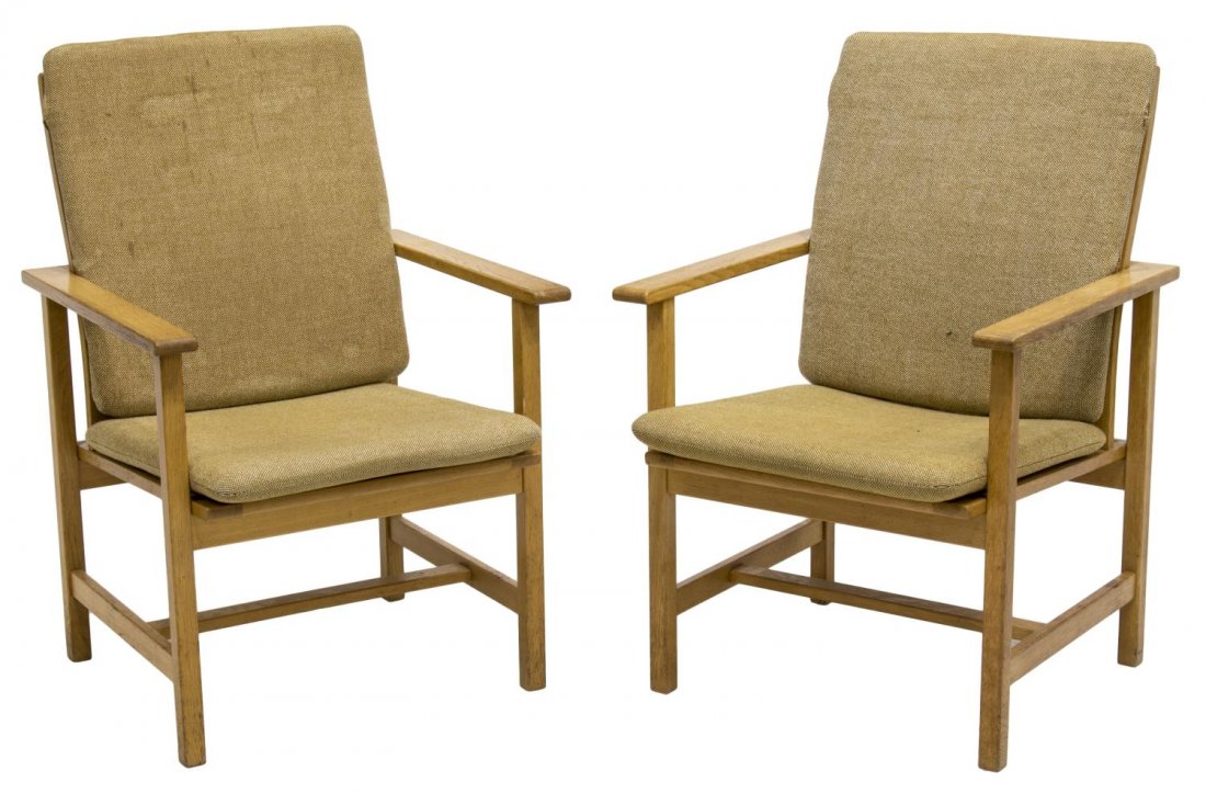 (2) BORGE MOGENSEN DANISH MID CENTURY ARMCHAIRS: (pair) Danish mid-century modern blonde oak open armchairs, designed by Borge Mogensen (1914-1972) for 'Fredericia Stolefabrik', the slat backrest over flat armrests, above the seat supported by coate