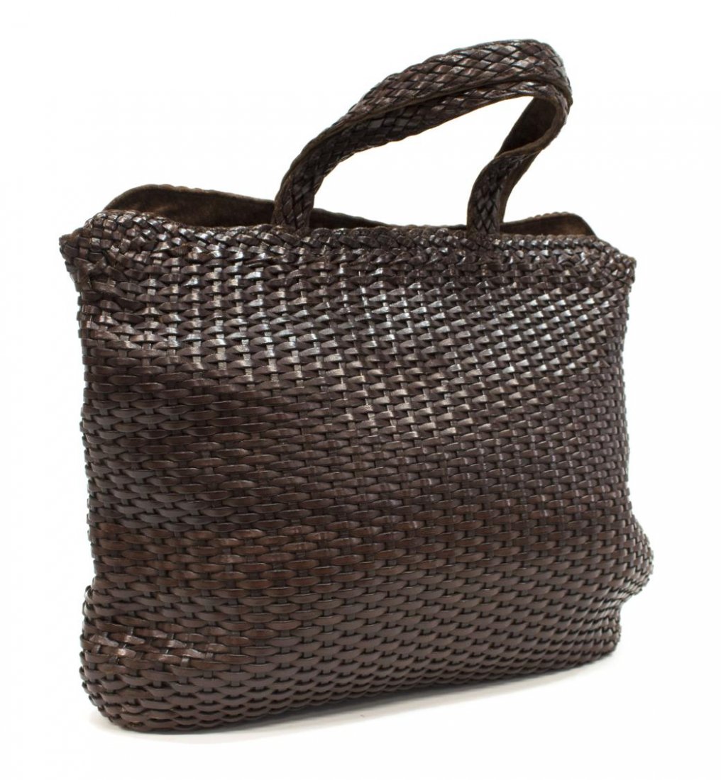 GUCCI WOVEN BROWN LEATHER & SUEDE TOTE BAG: Gucci woven brown leather tote bag, having double handles over a snap closure top, opening to suede interior with single zipper pocket, bag: 14.5"h, 17"w, 5"d, 1.25lbs *Provenance: Luxury goods offere
