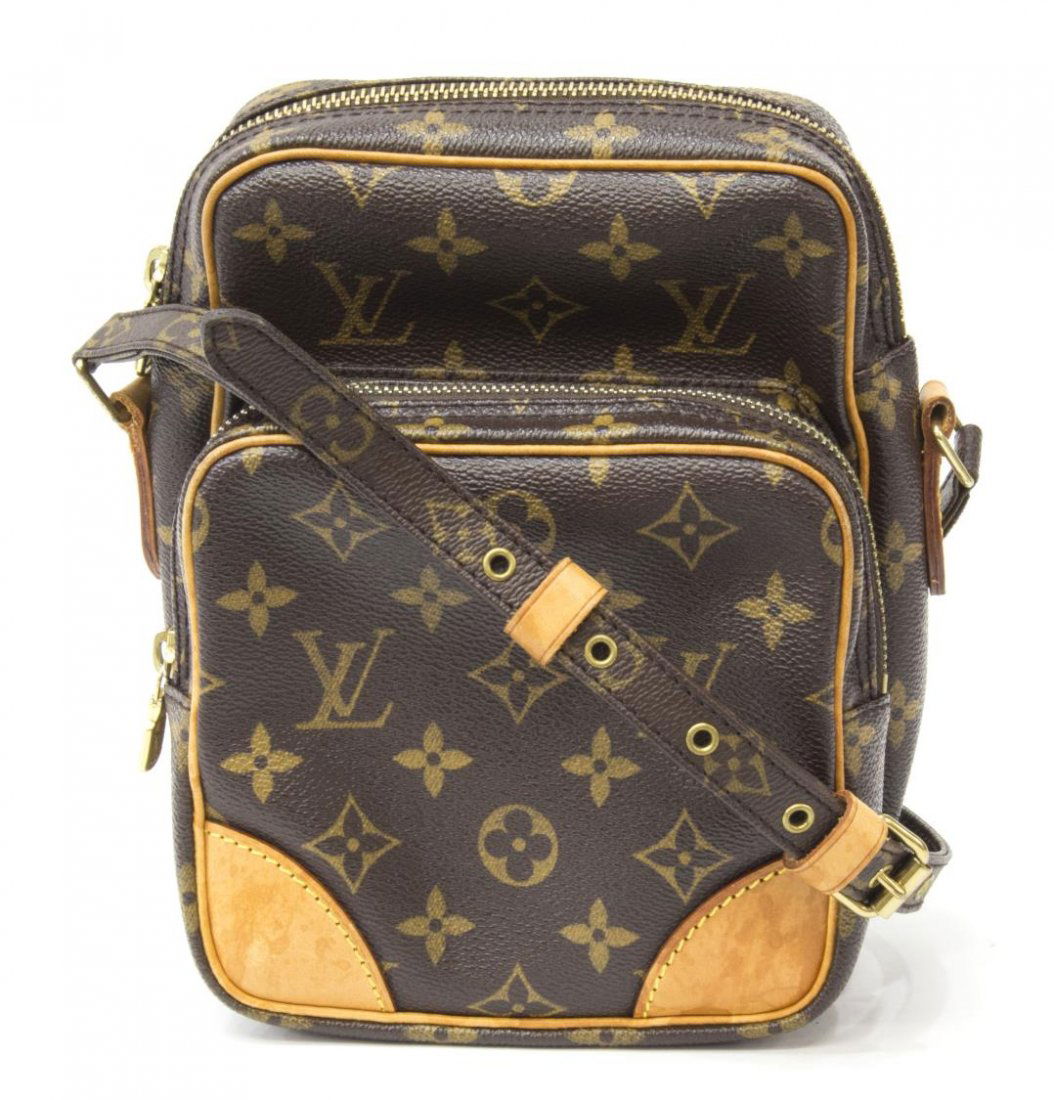LOUIS VUITTON 'AMAZONE' MONOGRAM SHOULDER BAG: Louis Vuitton "Amazone" shoulder bag in monogram canvas, adjustable shoulder strap, gold tone hardware, two zippered pockets, one having interior slip pocket, accompanied by dust bag, some stains, pat