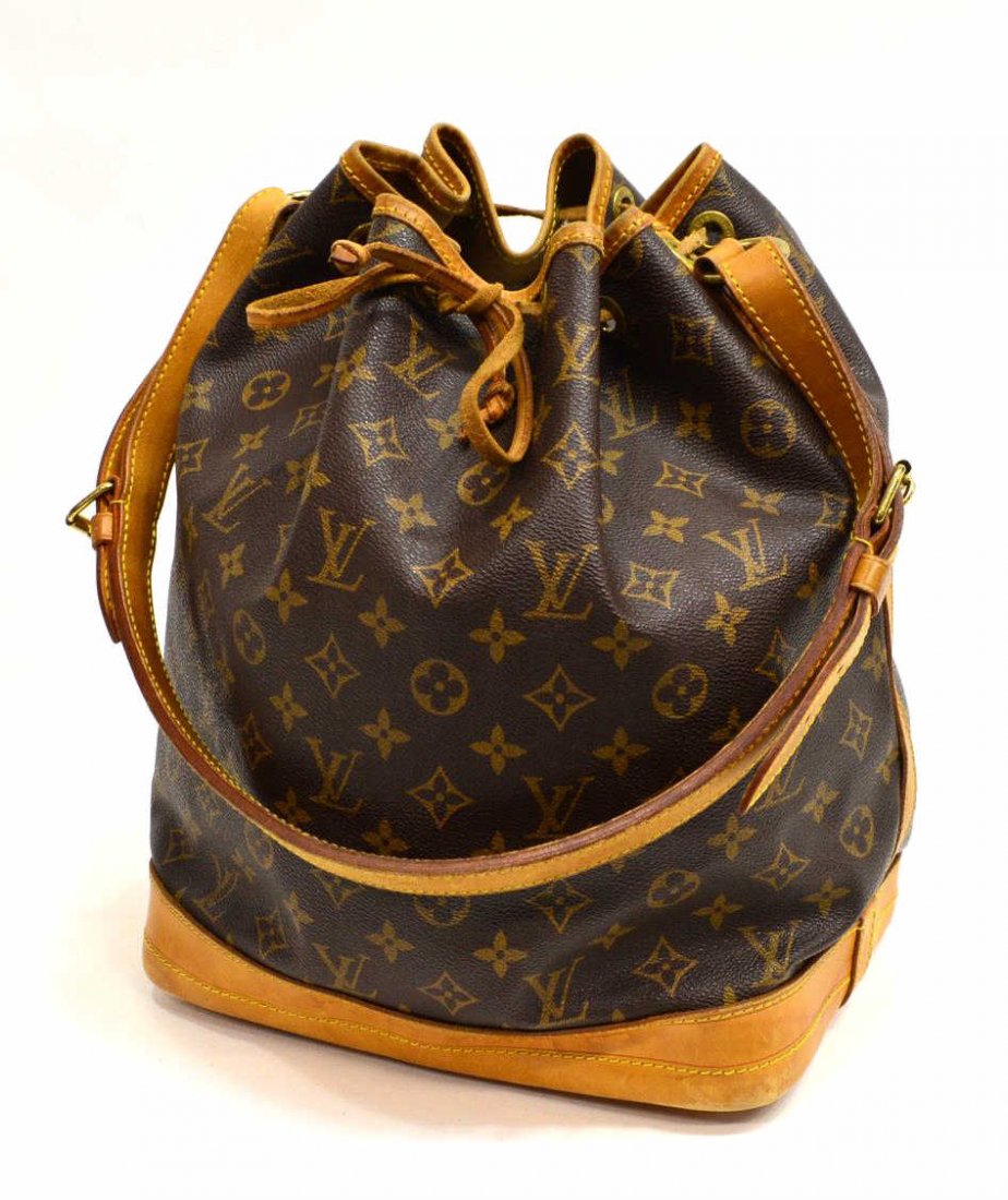 LOUIS VUITTON MONOGRAM CANVAS NOE DRAWSTRING BAG: Louis Vuitton "Noe GM" drawstring bucket tote in monogram canvas with leather trim, long adjustable leather strap, wear to leather and drawstring, patination and some small black spots to bottom, bag: