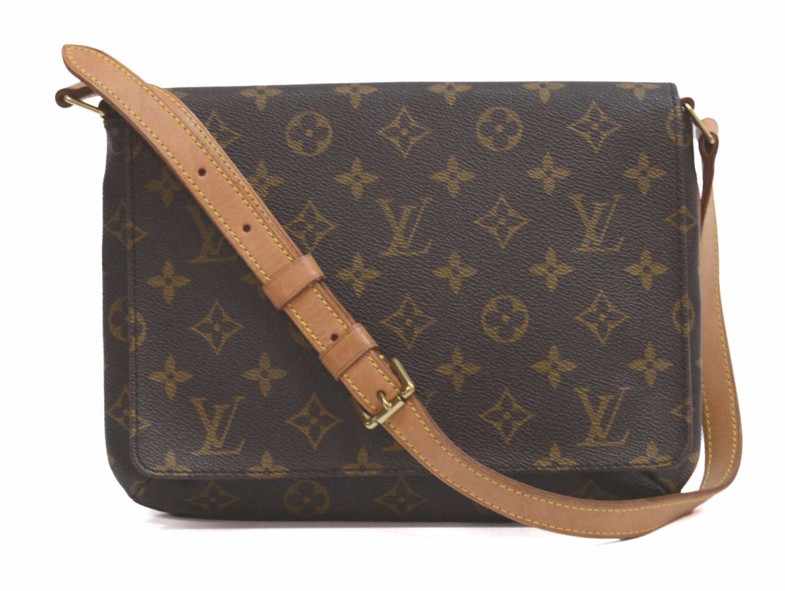 LOUIS VUITTON MUSETTE TANGO SHOULDER BAG: Louis Vuitton 'Musette Tango' shoulder bag in monogram canvas, adjustable leather shoulder strap, orange alcantara lined interior with single slot pocket, white mark to back, minor wear to piping, pat
