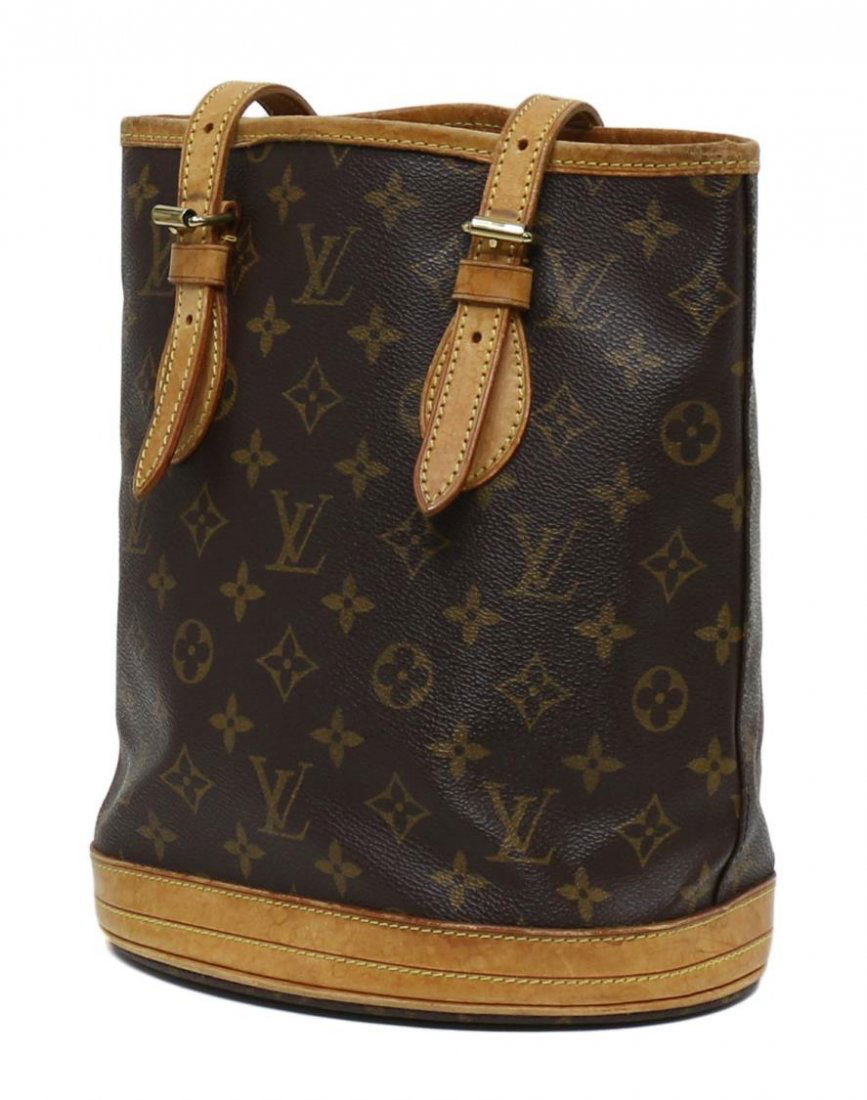 LOUIS VUITTON MONOGRAM CANVAS BUCKET BAG: Louis Vuitton "Bucket PM" shoulder bag in monogram canvas with leather trim, side zipper pocket and open cell pocket, double leather traps, accompanied by dust bag, dry and cracked leather strap, bag: