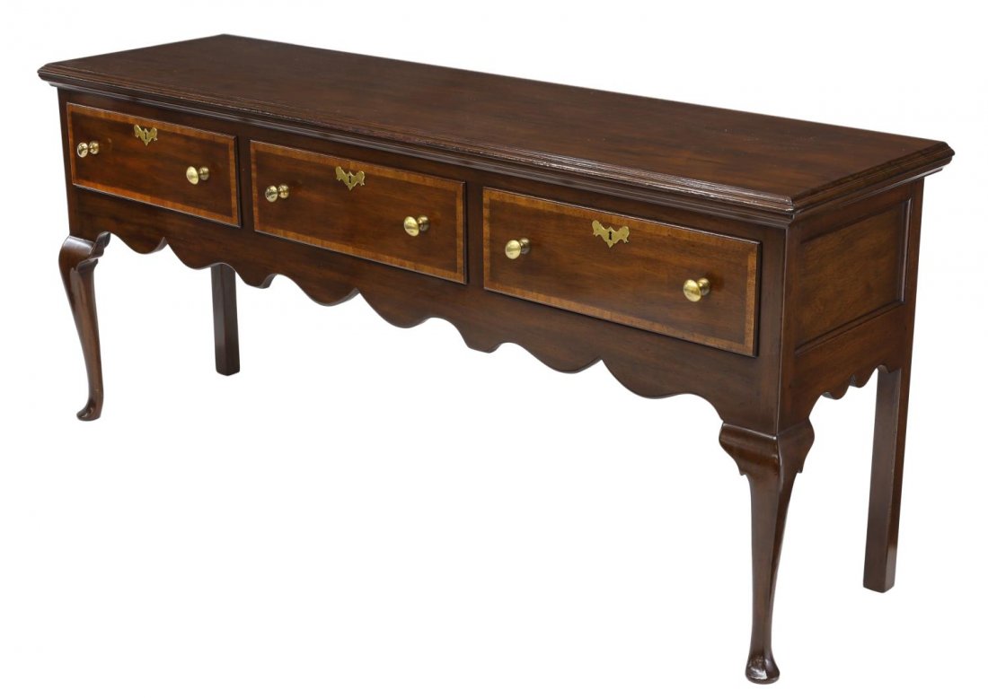 KITTINGER COLONIAL WILLIAMSBURG SIDEBOARD: Kittinger sideboard bearing the mark of the Colonial Williamsburg Foundation, a mahogany Queen Anne style with rectangular top over three large drawers above the scalloped skirt, rising on pad foot ca