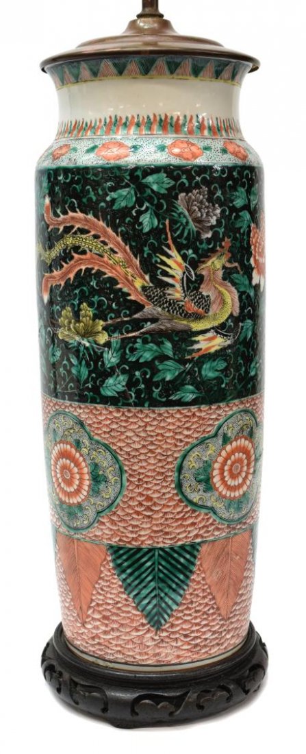 CHINESE VERTE FAMILLE TALL VASIFORM LAMP: Chinese verte famille tall vase converted to lamp, the single light over a metal lid, above the short neck and long tapered body, decorated with bands of Phoenixes and foliates on black ground, floral