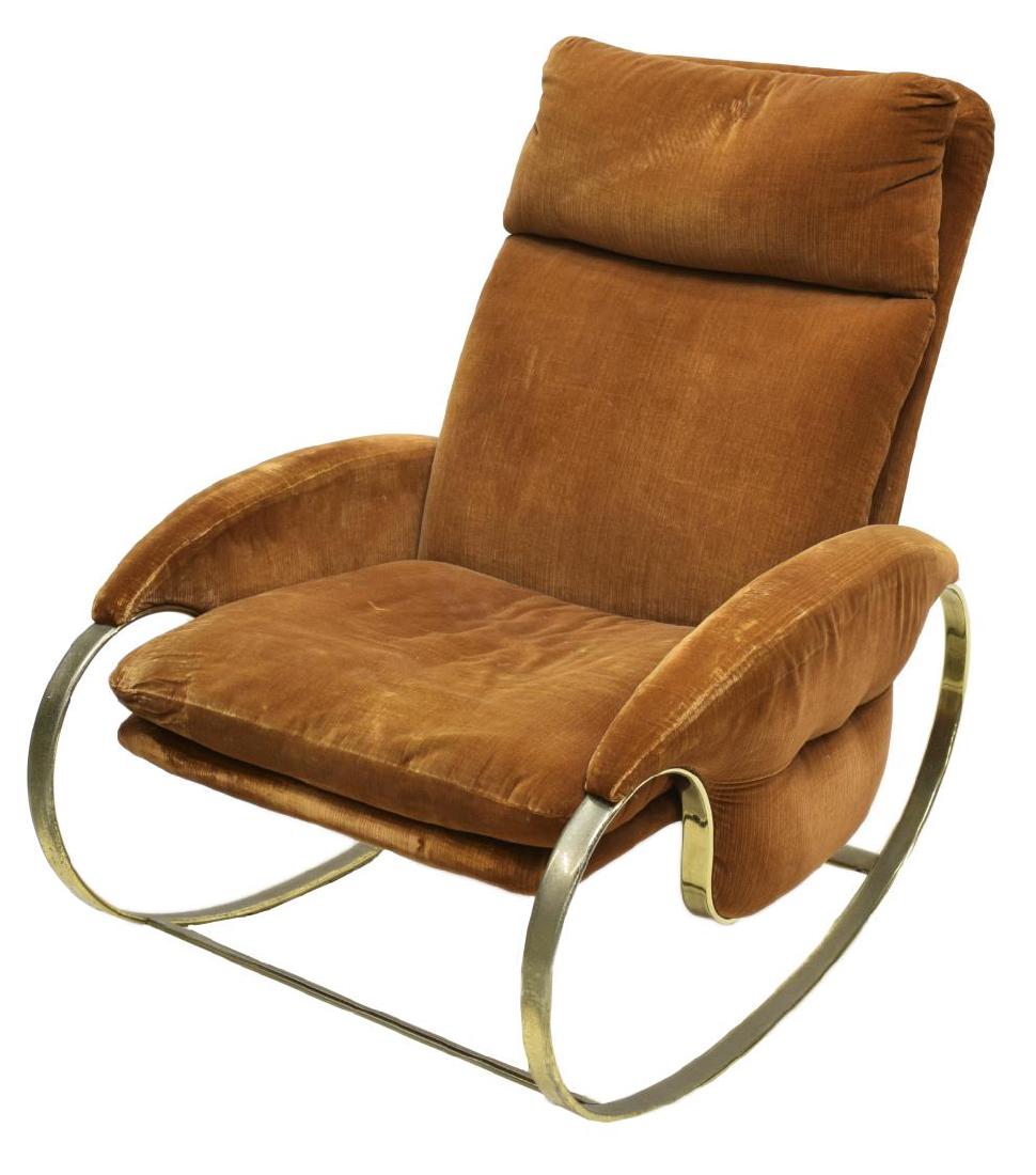 ITALIAN MID-CENTURY STEEL FRAMED ROCKING CHAIR: Italian mid-century modern rocking chair, oval steel frame with remnants of gilding, upholstered and padded in worn orange velvet like fabric, approx 38"h, 26"w, 35.25"d Start Price: $150.00