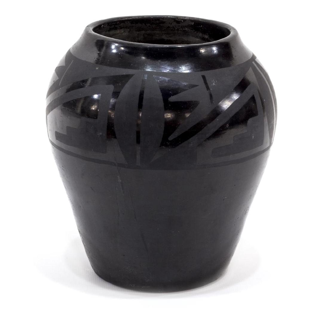 MARIA & JULIAN MARTINEZ BLACKWARE POTTERY VASE: Native American San Ildefonso black pottery vase, by Maria and Julian, signed underfoot, with glaze loss, 7"h, 6" diam., 2lbs Start Price: $300.00