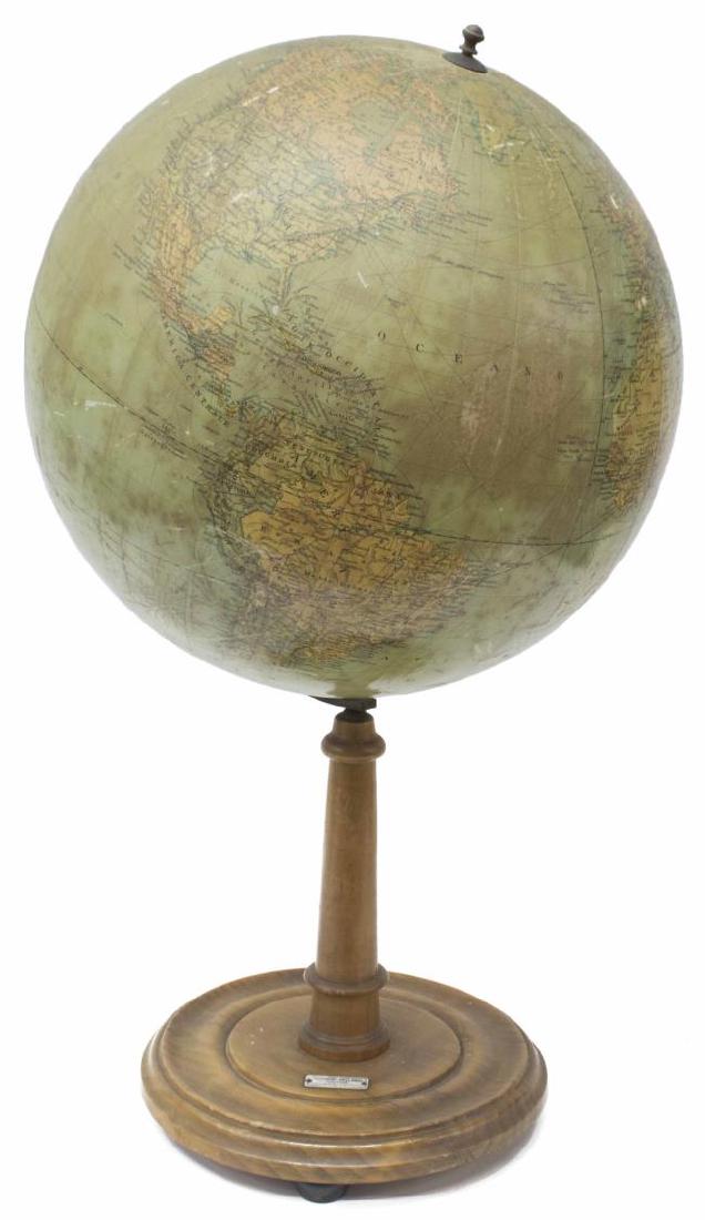 VINTAGE ANTONIO VALLARDI TERRESTRIAL GLOBE: Vintage Italian paper-mache terrestrial globe, design by Antonio Vallardi, on round wood stand, discoloration and wear to paper, approx 27"h, 16"diam, 5.5lbs Start Price: $150.00