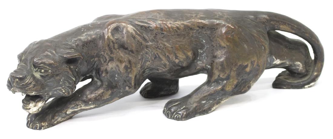 ITALIAN FIGURAL METAL STATUE, SNARLING TIGER: Italian tiger or cougar, metal clad with remnants of silver plate finish, signed to side and marked underfoot, approx 4"h, 3"w, 13"l, 2.5lbs Start Price: $50.00