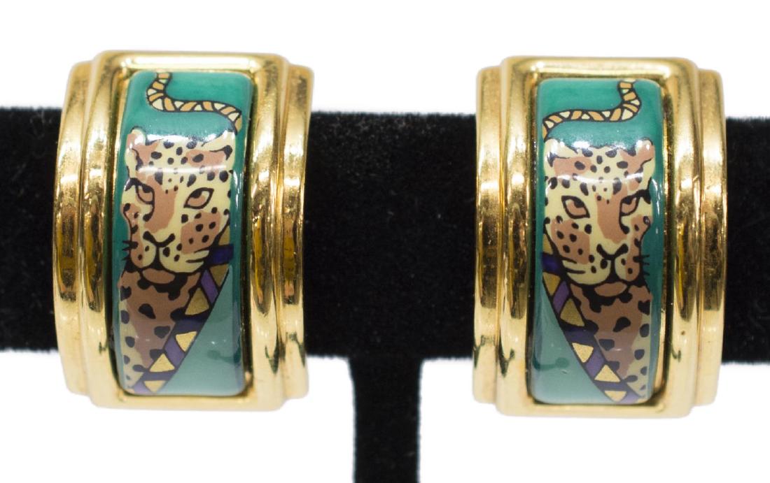 (2) HERMES ENAMEL & GOLD TONE LEOPARD EARRINGS: (pair) Hermes enamel and gold tone earrings, printed image of a leopard on a green enamel ground, H-form clip on back, marked Hermes, square small S and G centering a P, 15.5 grams total *Provenance: 