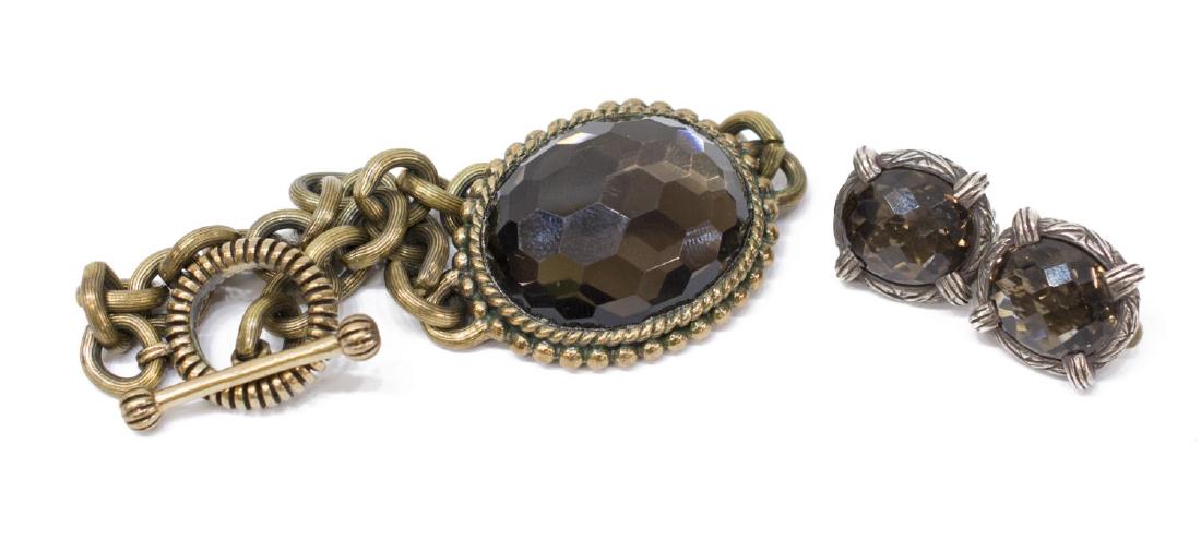 (3) STEPHEN DWECK SMOKY QUARTZ JEWELRY GROUP: (pair) Stephen Dweck faceted smokey quartz jewelry: (pair) earrings, in a sterling silver frame, clip on, .65"l; (1) smokey quarts faceted cabochon set in bronze frame, approx 7.75"l; 61.2 grams (incl